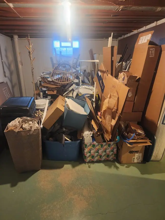 Roll-off dumpster container at job site for Yard Waste Dumpster Rental in Heflin